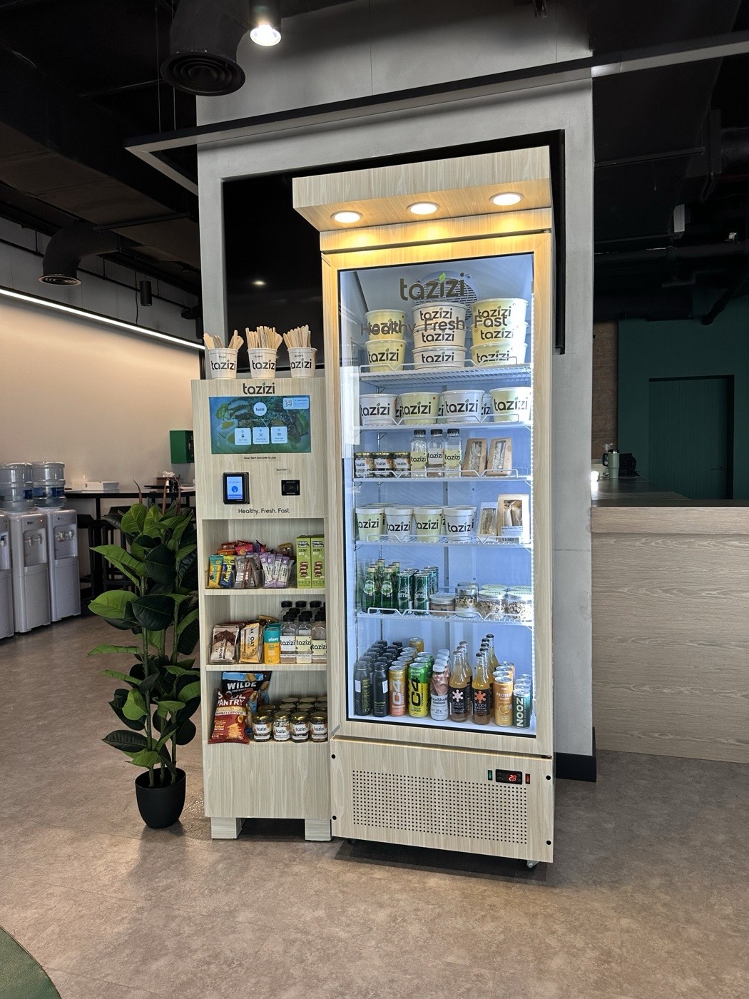 A Tazizi fridge and kiosk newly installed in a Dubai office
